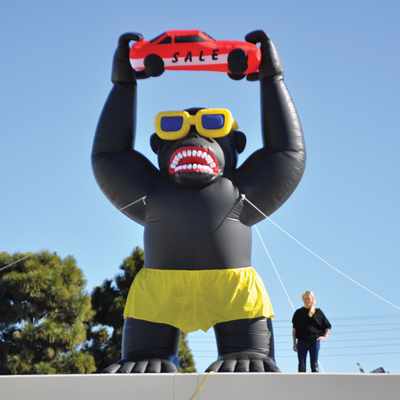 Image result for inflatable gorilla car dealership